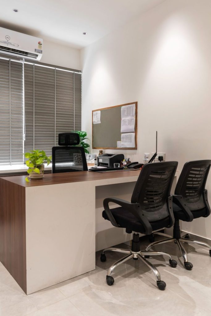 A contemporary office space with sleek furniture, perfect for business meetings.